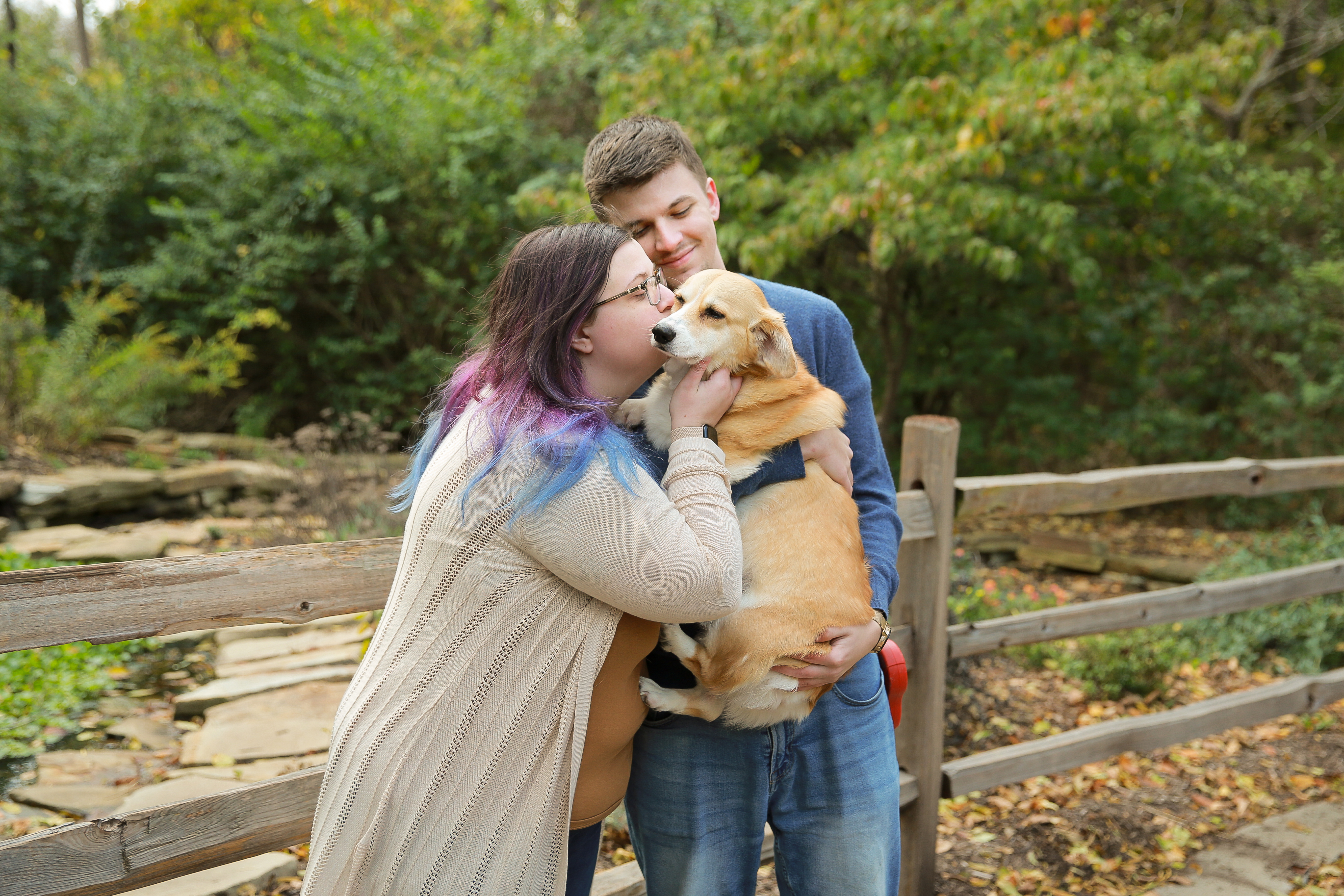 Joe and Joanne holding Gidget in their Engagement photos
